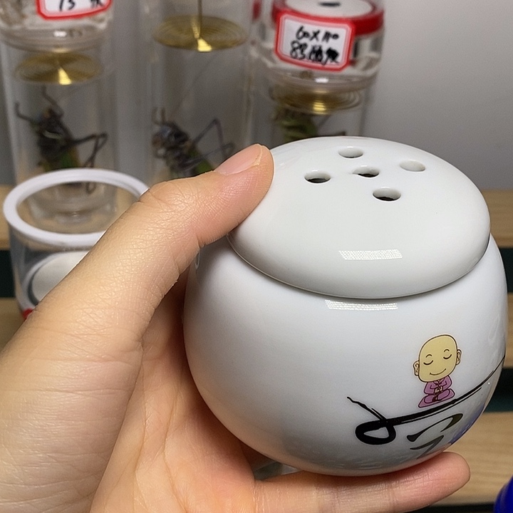 蝈蝈一对罐子和尚