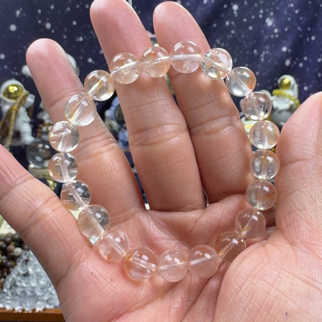 水晶手串未镶嵌（多人）巴西芬达色飘花胶花水晶手串