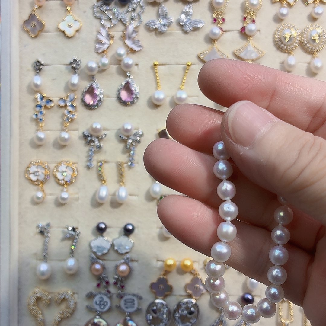 是***呀合金淡水珍珠耳饰