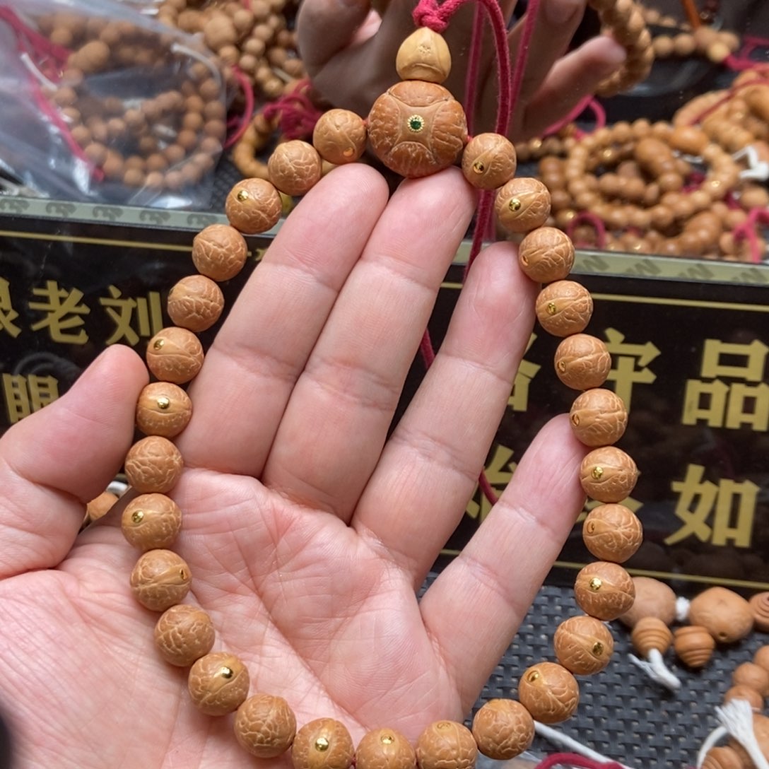 凤眼菩提吊坠11.5金钉手持