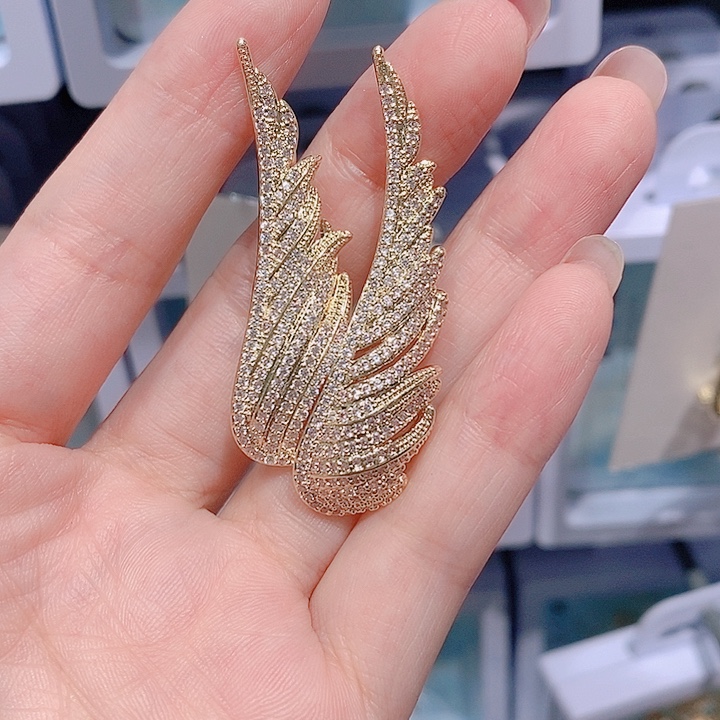 锆石铜合金翅膀胸针