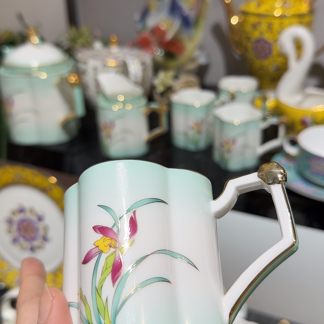 蔷****骨瓷珐琅彩工艺制作