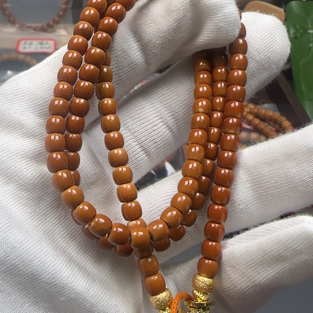 手串橄榄核老挝脖挂正三花微白5.6福利