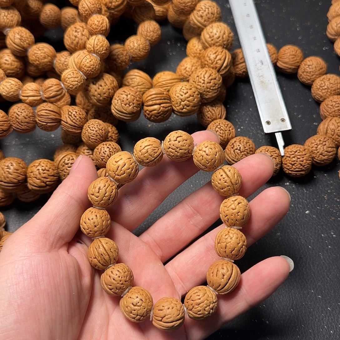 ****我吊坠桃核野生手串