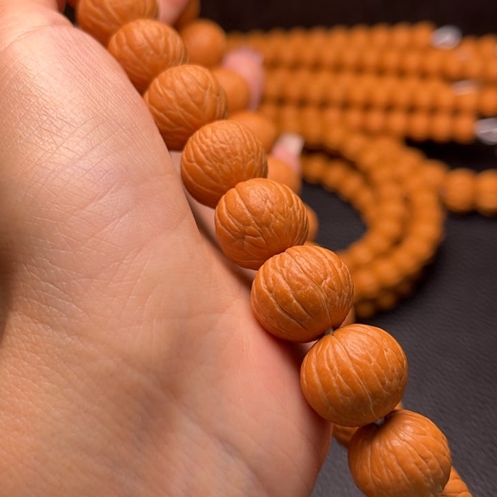 猴头核桃吊坠凤羽手持