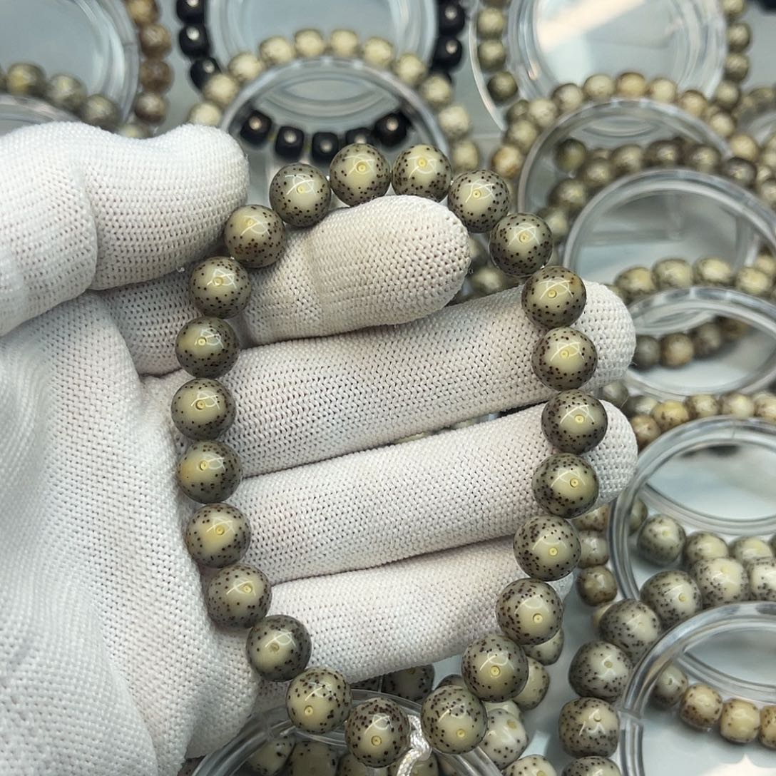 星月菩提手串海南星月菩提石玉料10圆龙蛋手持