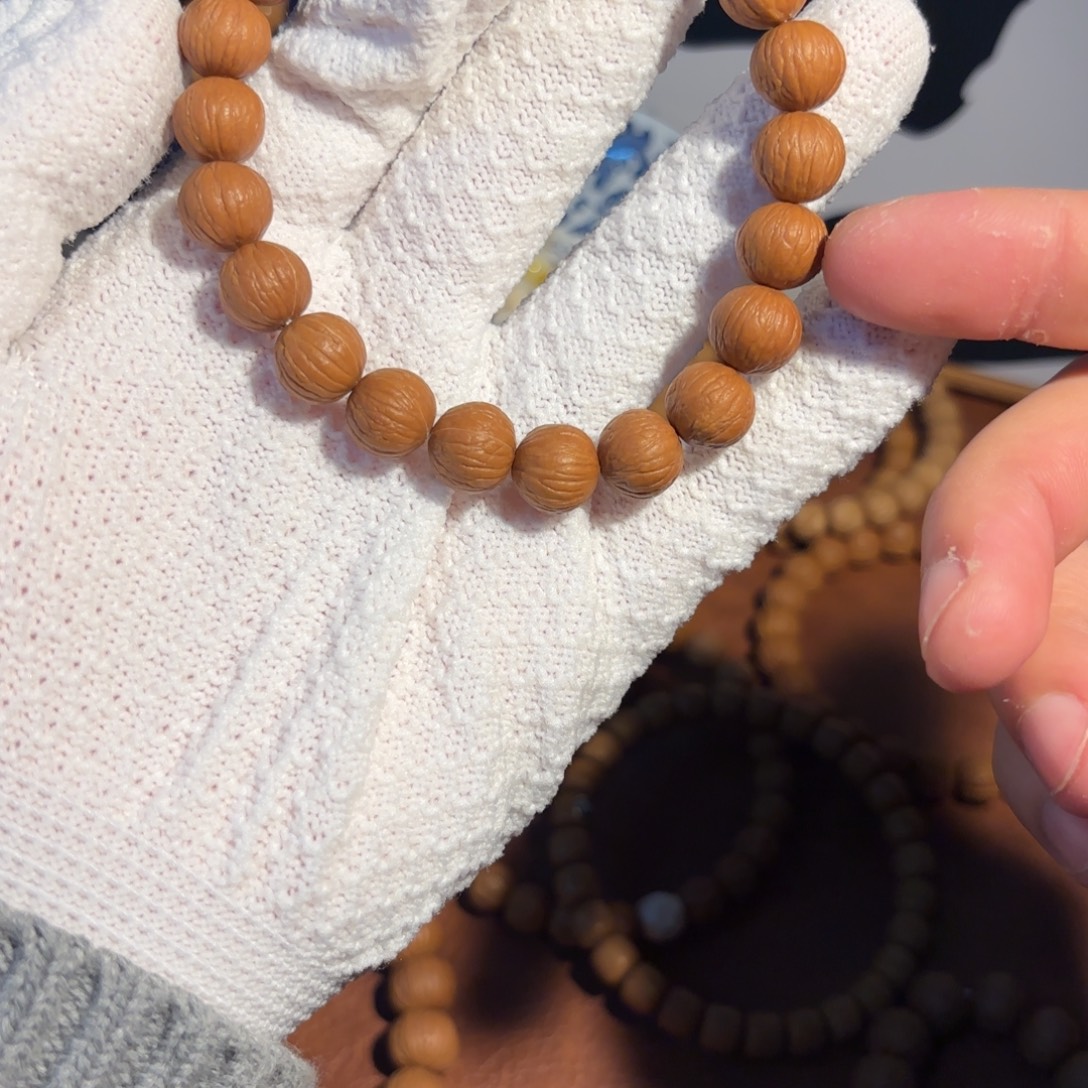 听***茗吊坠猴头核桃小凤羽