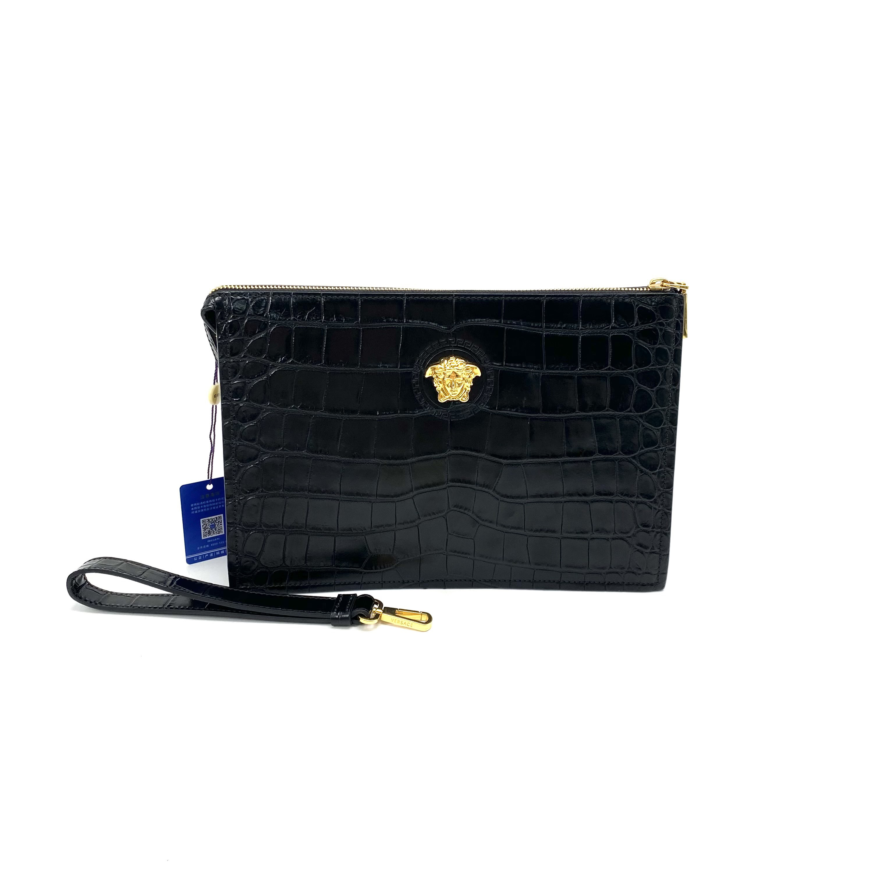 95新 VERSACE/范思哲 98新 范思哲 黑色全皮手拿包 尺寸28/19 