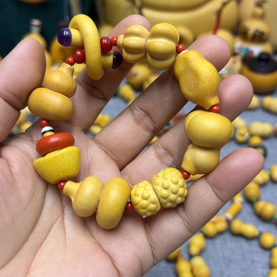 浩***航草里金多宝手串精品