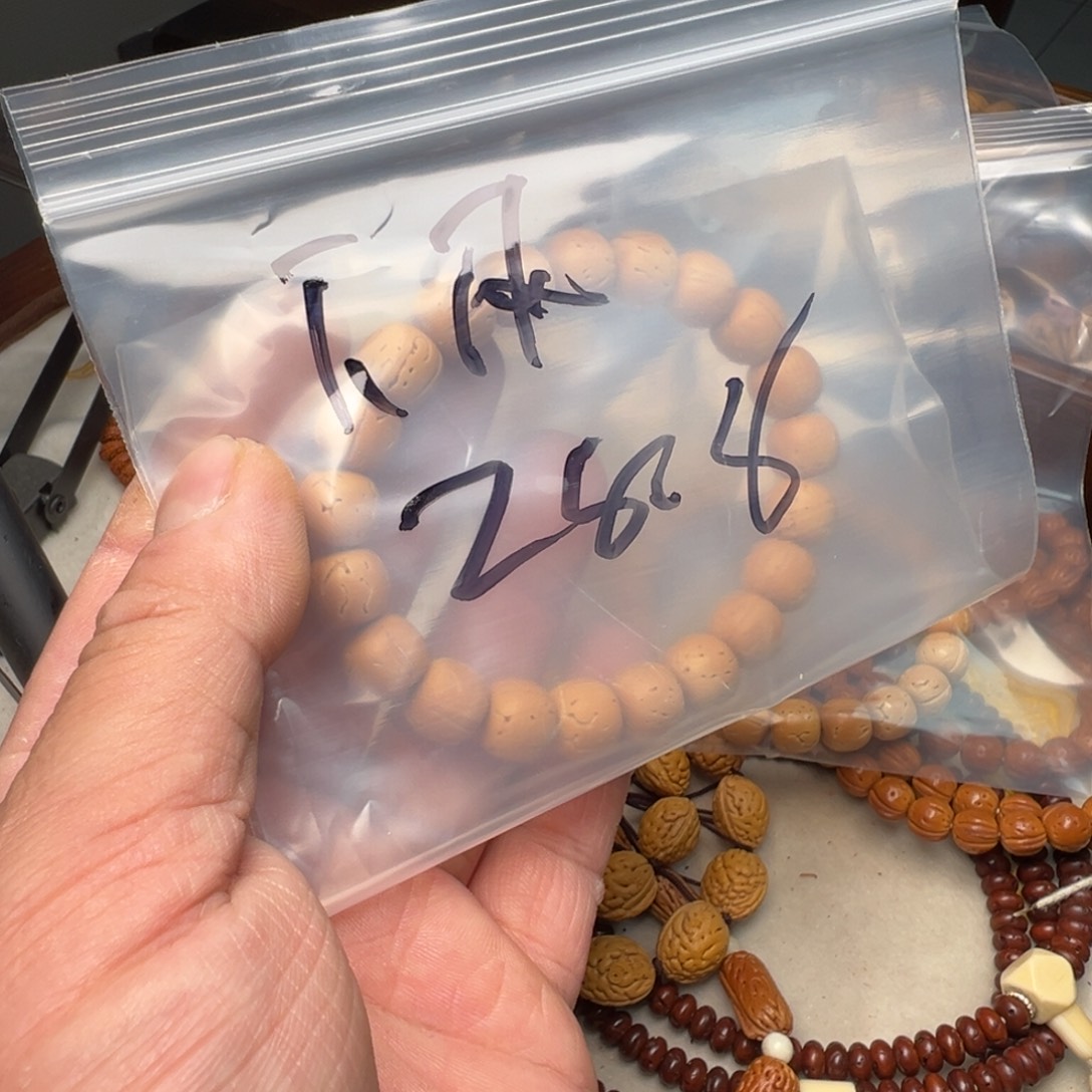 下***.三醋酯纤维盘锦桃核