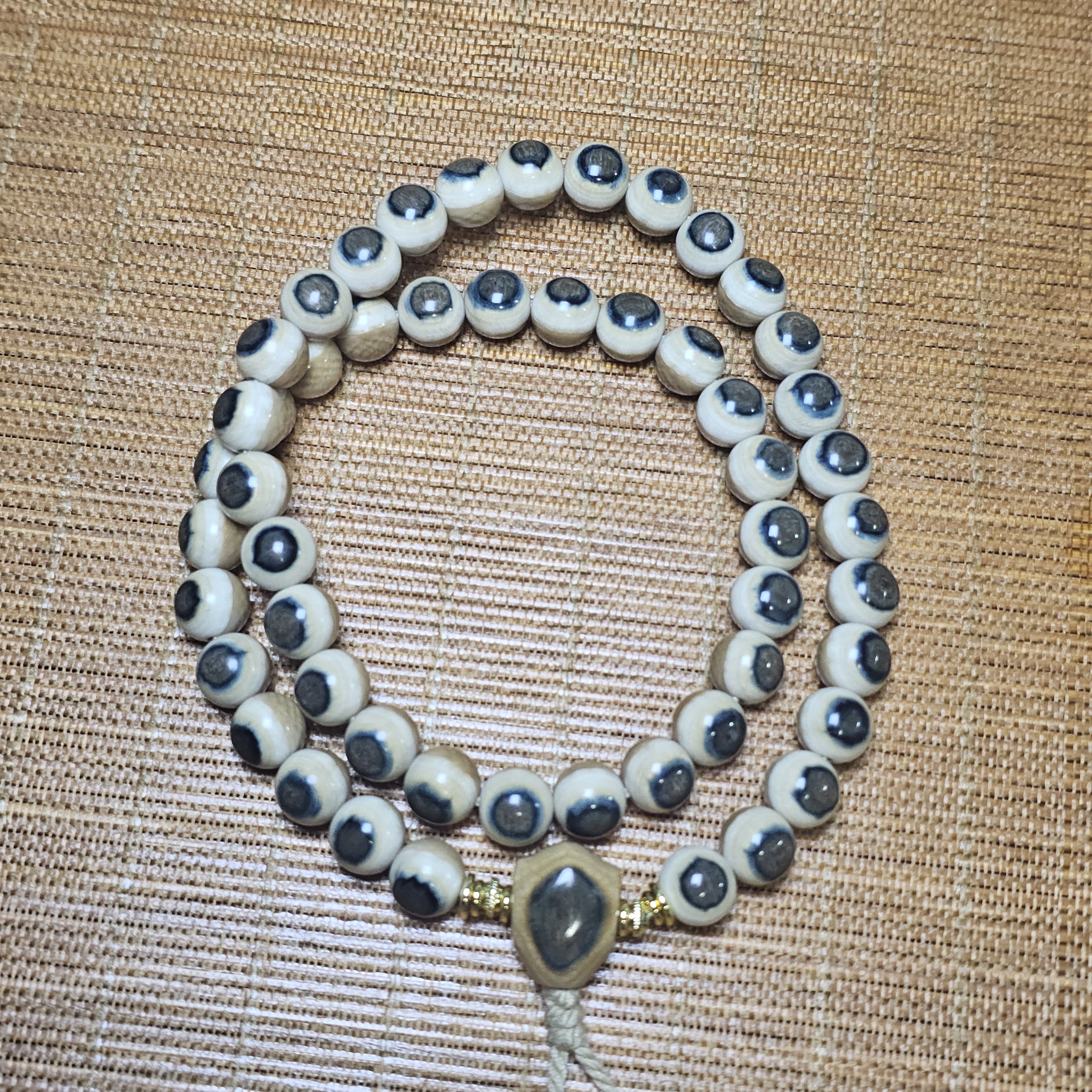 天然猛犸牙0.8➕蓝眼咖肉手持52颗可做双圈手串