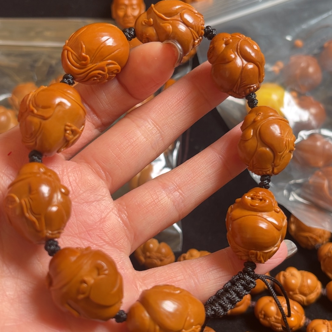 静***心橄榄核吊坠米勒串