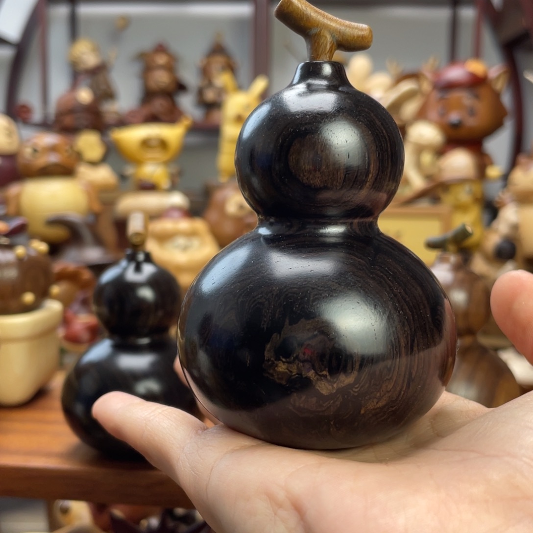 ****菜木微瑕紫光檀葫芦