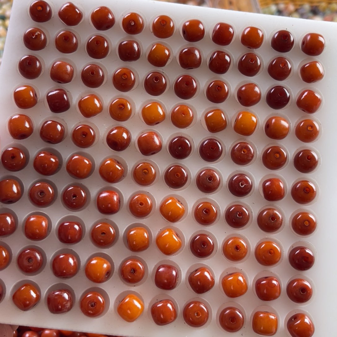 白玉菩提吊坠10-9橘红桶珠200颗