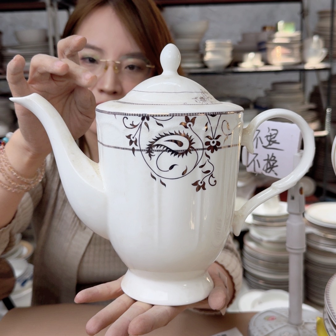 瓷茶壶瑕疵品不忒不还 