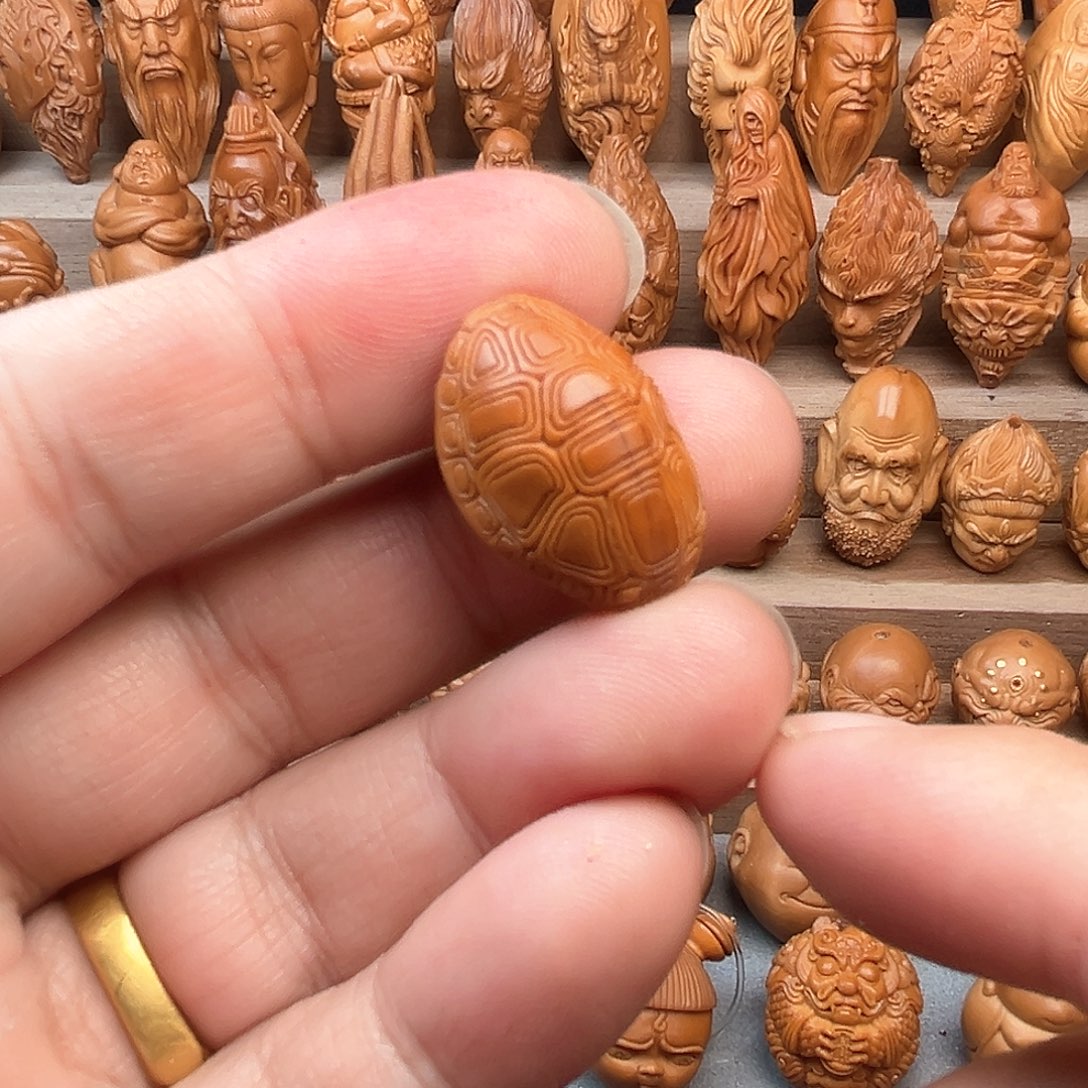 橄榄核吊坠17富甲天下