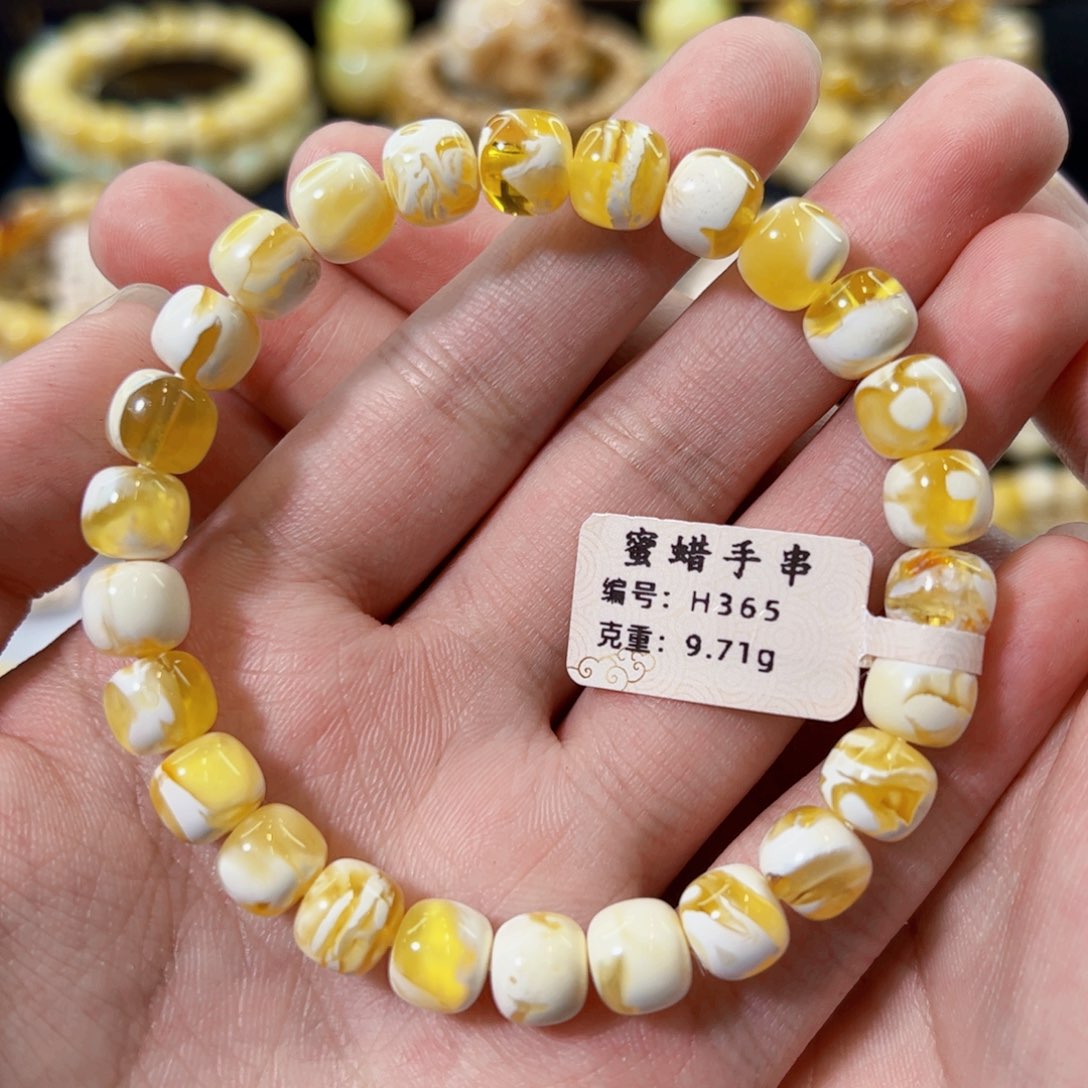 裸石琥珀未镶嵌8.5mm金漆白溶洞老型手串
