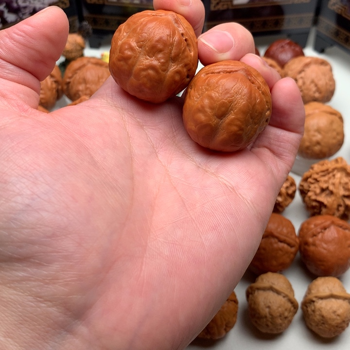 桃核把件?**谜野生小手捻