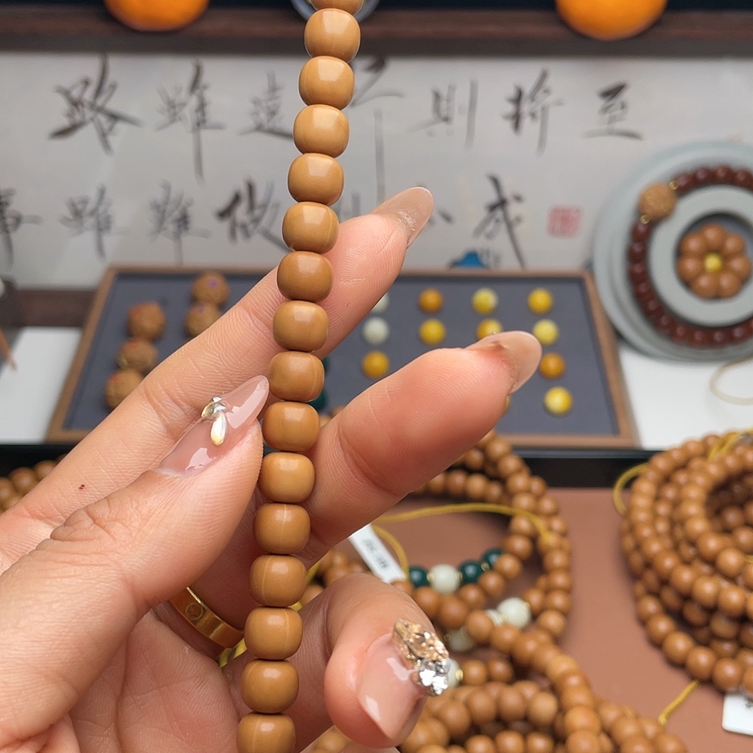 比***酷吊坠猴头核桃手串