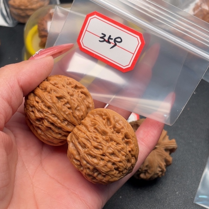 丶***某文玩核桃把件铁锤