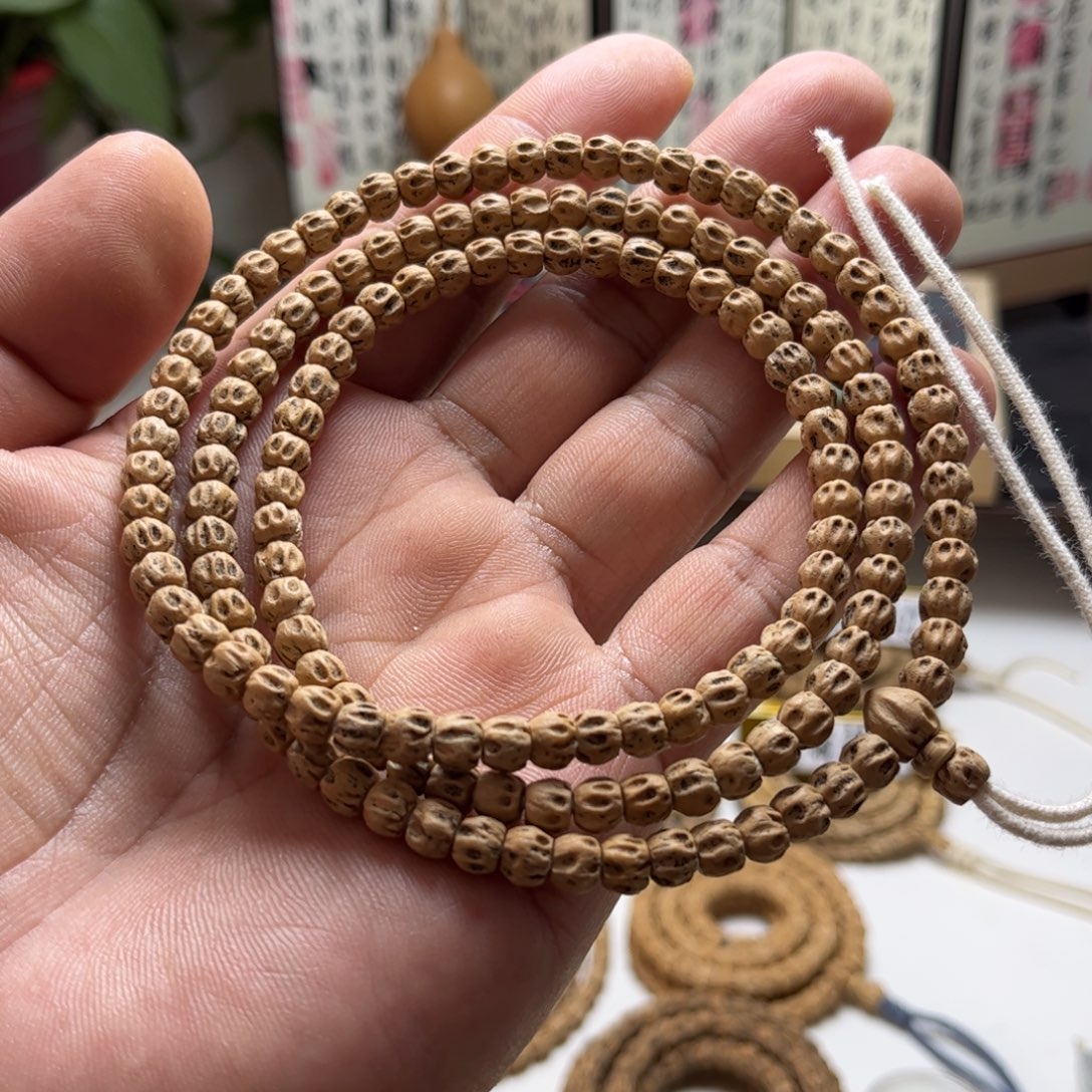 在***信吊坠柏香籽/百香籽双坑鬼王58