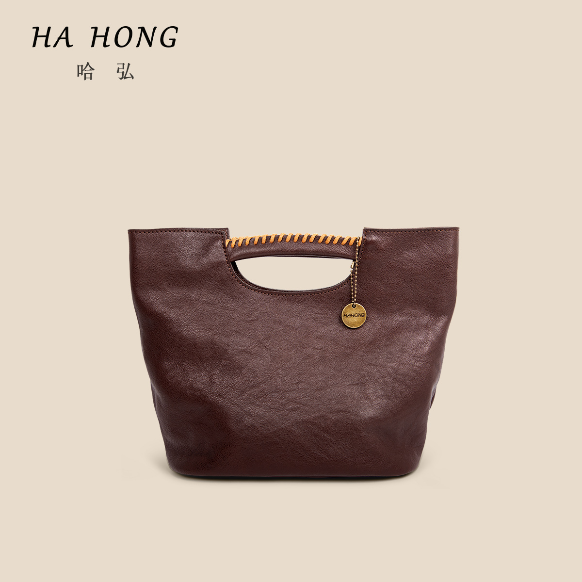 哈弘植鞣头层牛皮可单肩可斜挎包水桶包大容量手提包复古大气