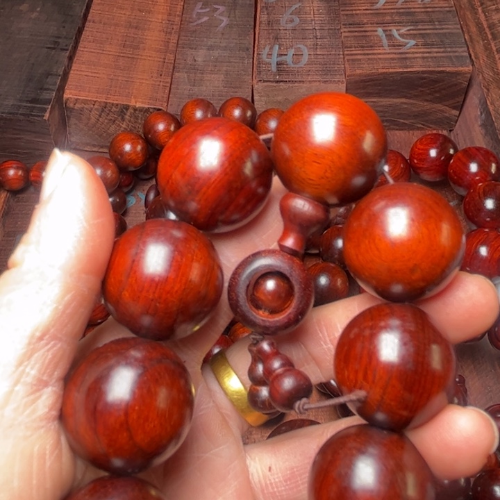 诚***信安达曼紫檀2.5×13颗三通0000000