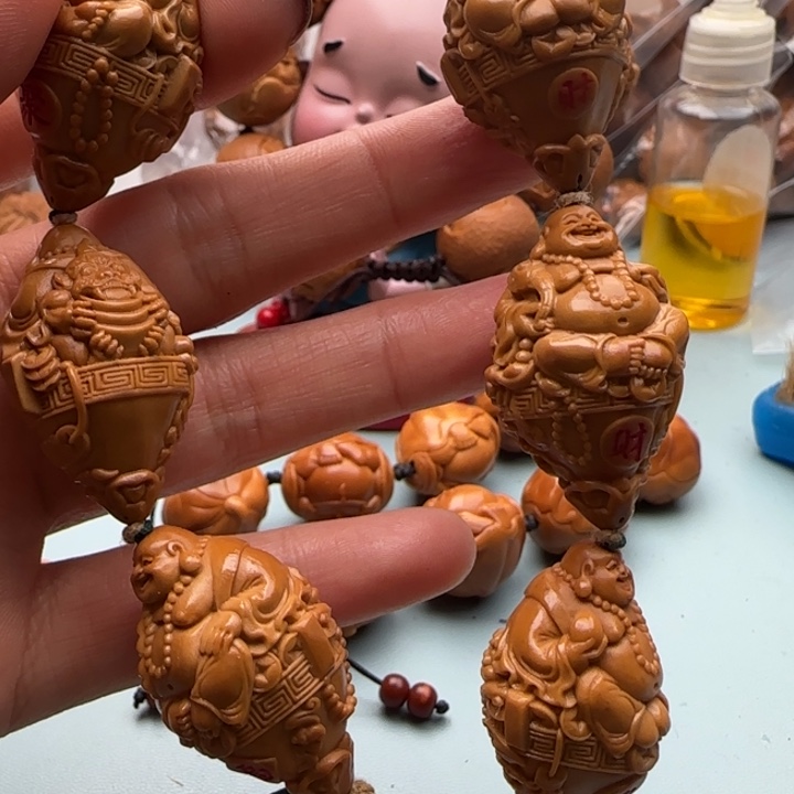 橄榄核手串雕刻工艺