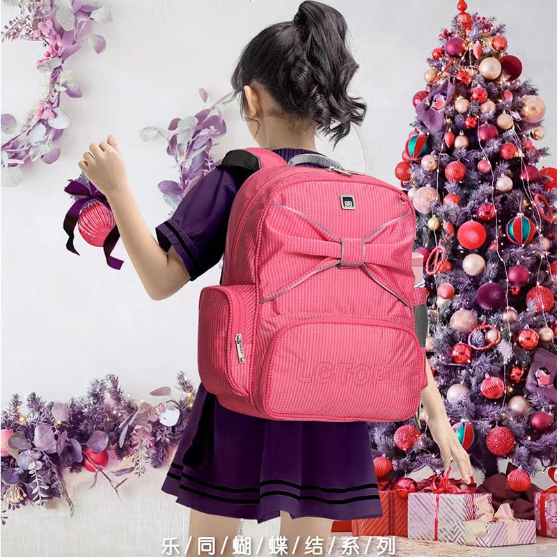 Letopo/乐同蝴蝶结女童书包减负护脊轻便儿童双肩背包