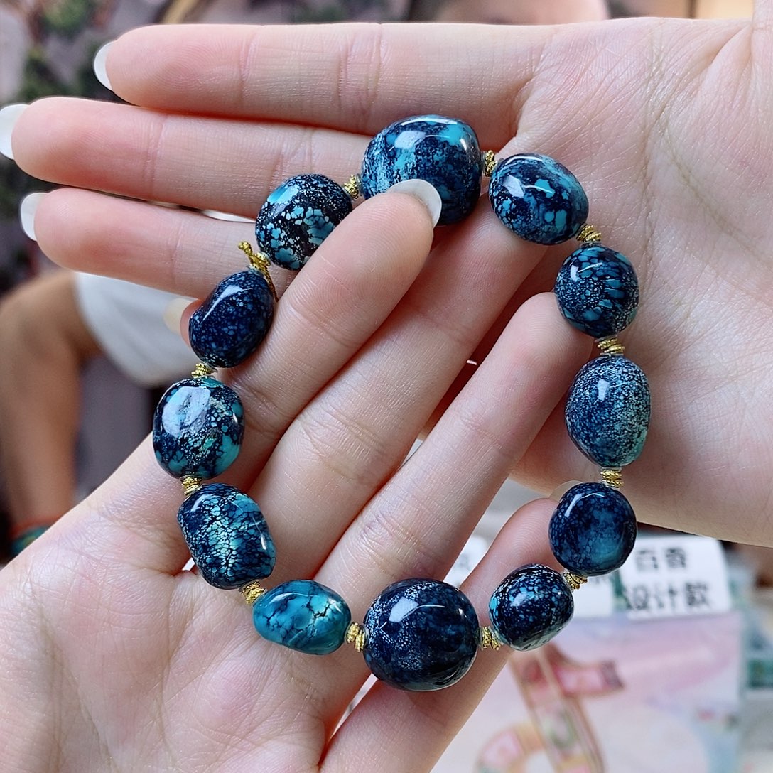 似****绿松石18K金镶嵌珠宝奇石