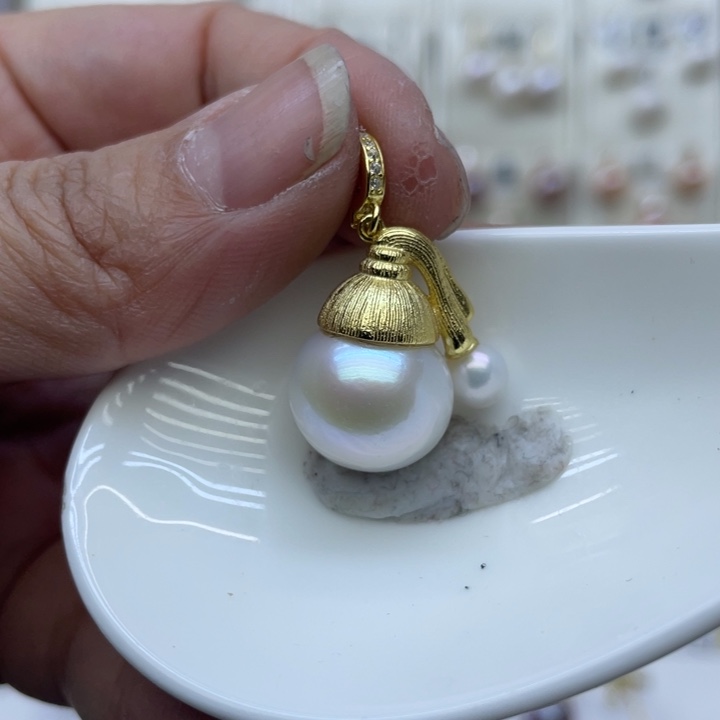 淡水珍珠吊坠(不含链)银S925镶嵌J****?