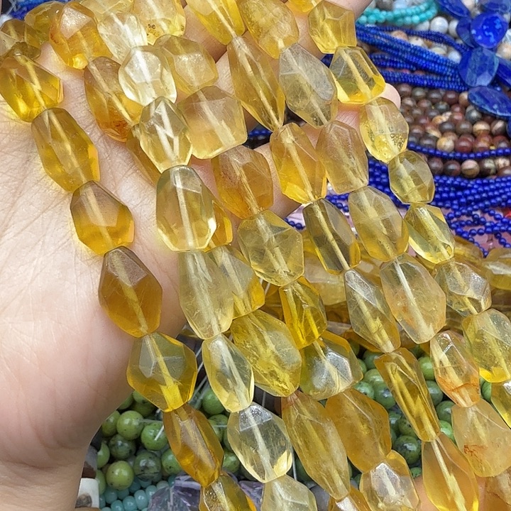 我***多珠宝半成品未镶嵌水晶黄水晶异形一条