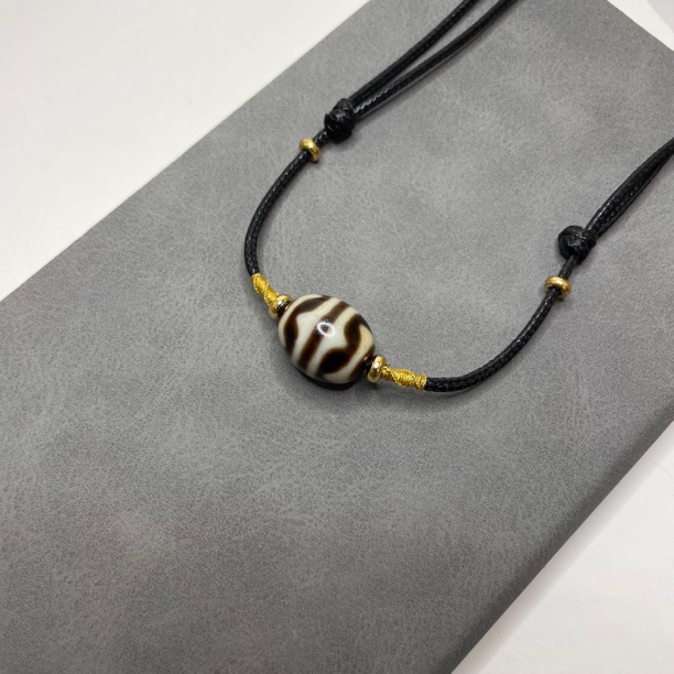 上肯家 藏式仿老『双牙牙 达洛』14*16.7搭串顶珠 镶蚀玛瑙台珠