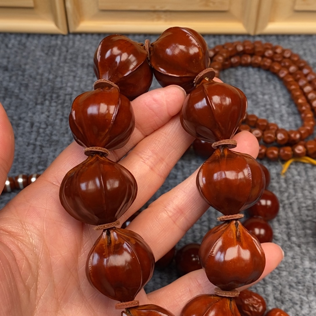 王***胜橄榄核手串/手链四花铁素