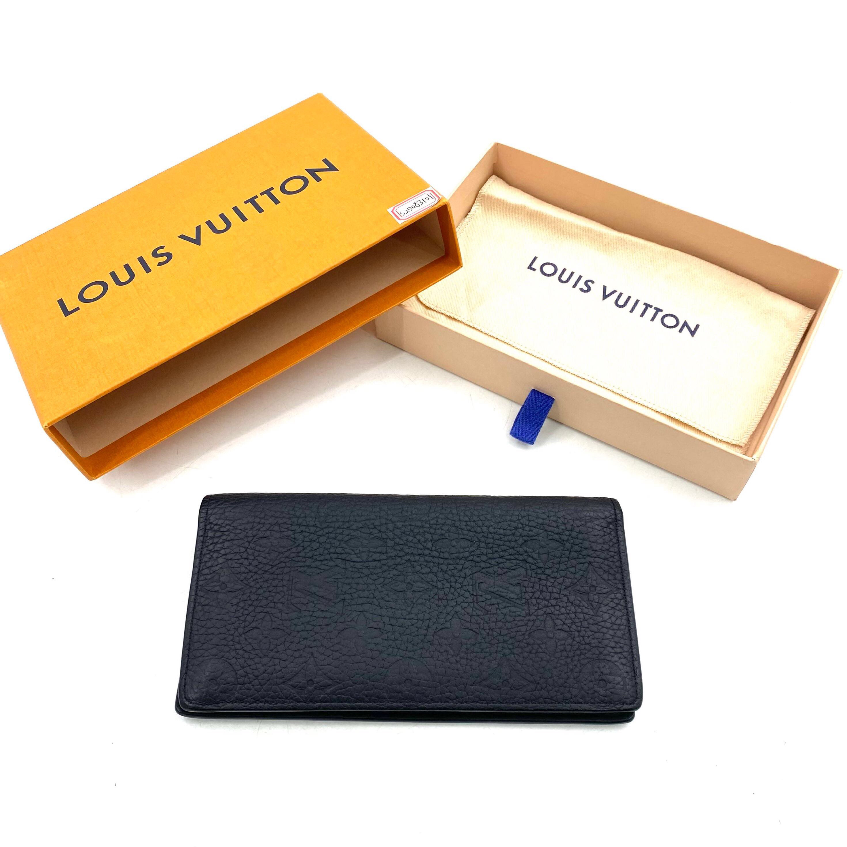 95新 LouisVuitton/路易威登 98新黑色全皮压花对折钱包尺寸19/10