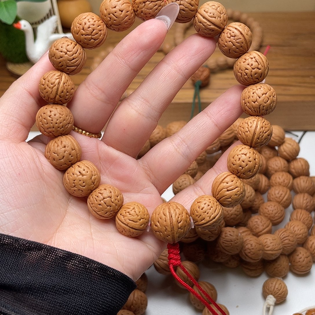 果***果15野生灯笼桃核手持