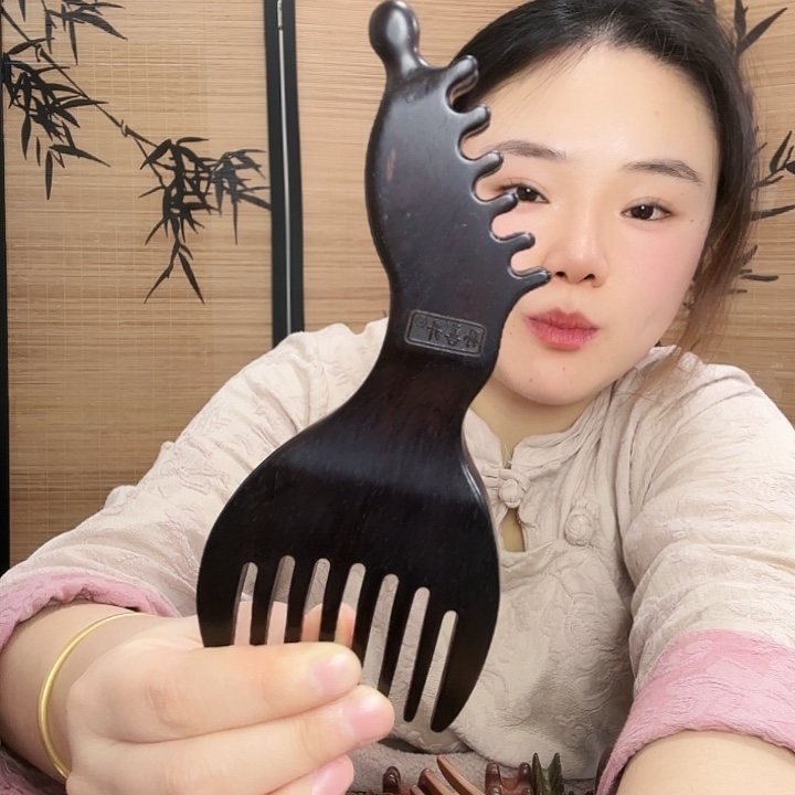 紫光檀凤凰梳子瑕疵