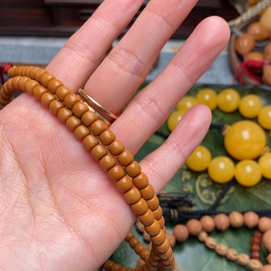 文玩核桃吊坠提**长手串