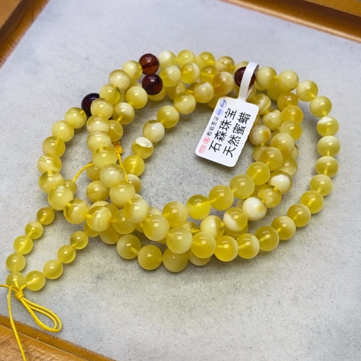 蜜蜡裸石未镶嵌串