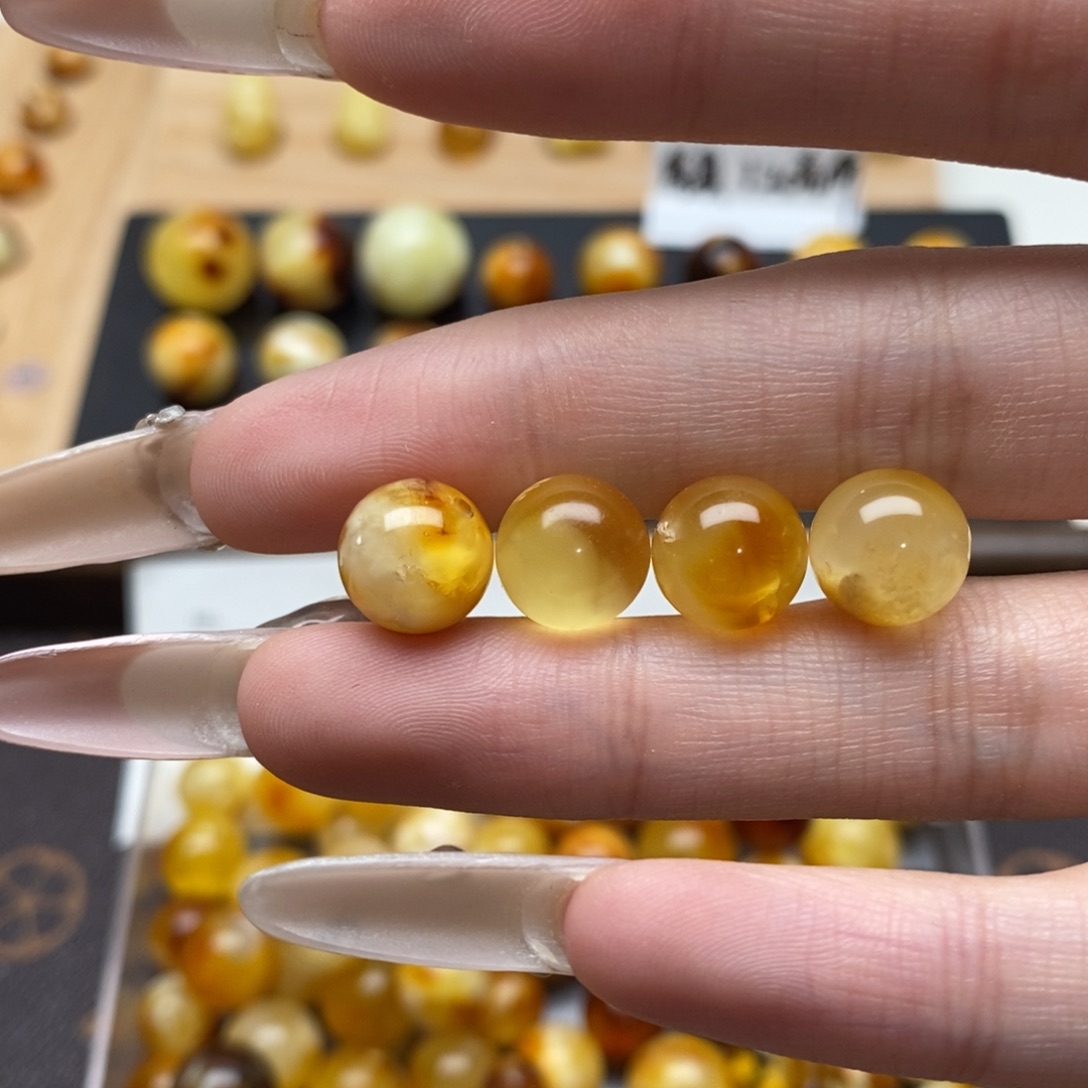 关***生琥珀未镶嵌珠宝奇石蜜蜡