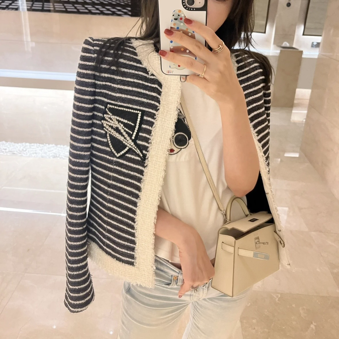 99新 BALMAIN/巴尔曼 D500388/黑白条纹开衫外套/38码