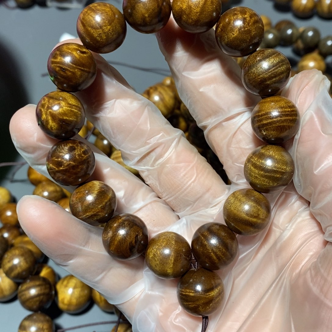 金丝楠牛***油小叶1.5手串微瑕