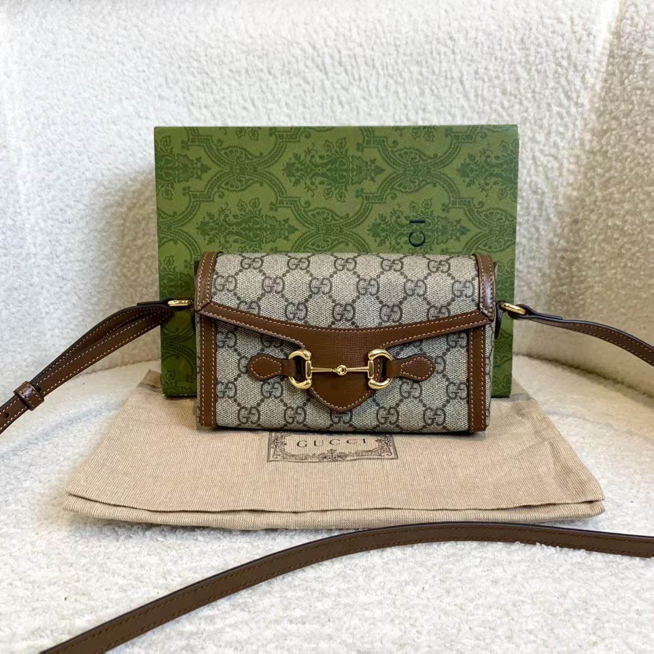 99新 GUCCI/古驰 壹臻/ 棕色老花横版手机包 69510897