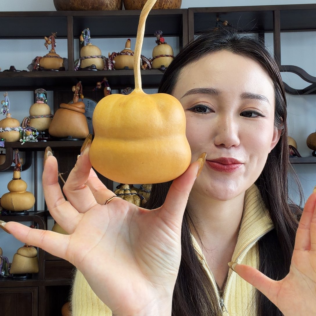 菜****熊猫脸钱袋子葫芦摆件