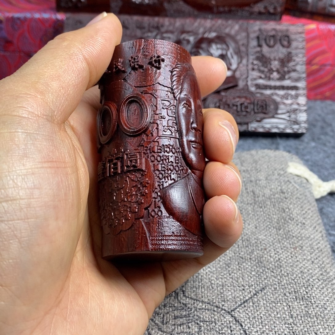 木手中有钱紫檀木1人物