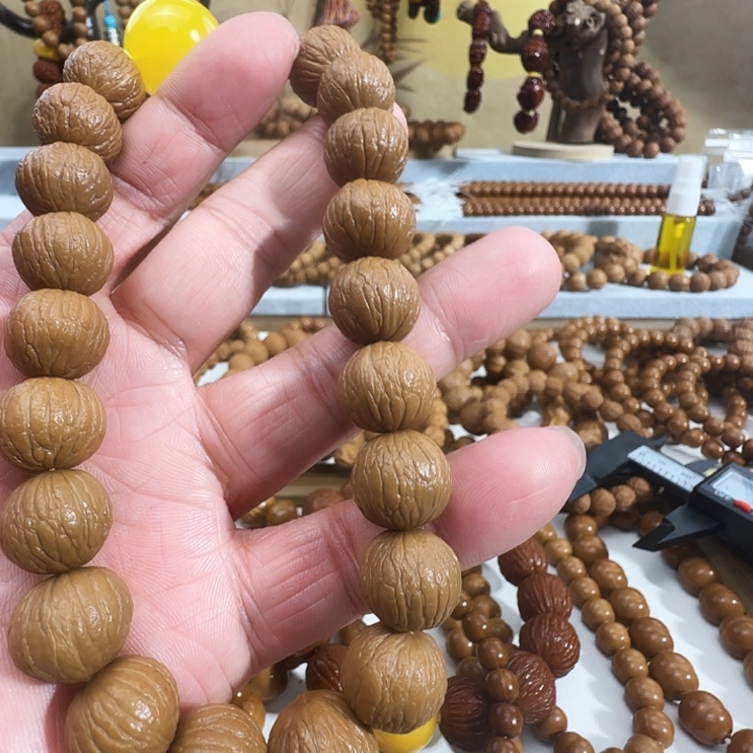 猴头核桃手串原皮原色猴头手串手持凤羽