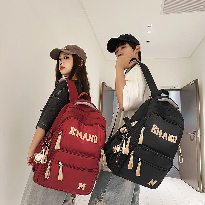 新款减压护脊大号书包防水初高中生书包大容量双肩背包韩版潮流