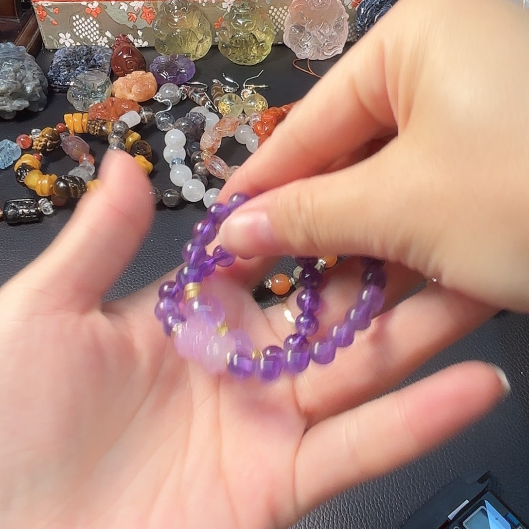 芊***羽水晶合金颈饰精美手机了