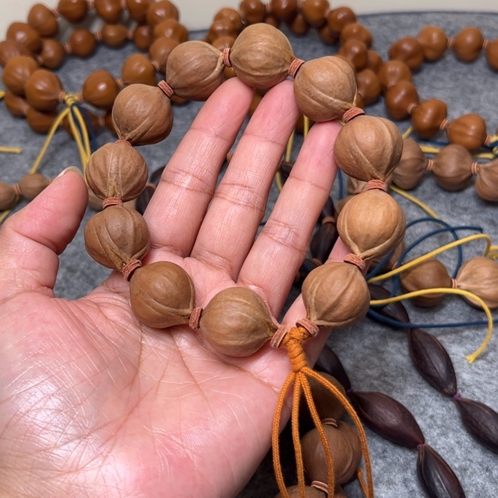 艳***里橄榄核手串/手链2.0*2.3