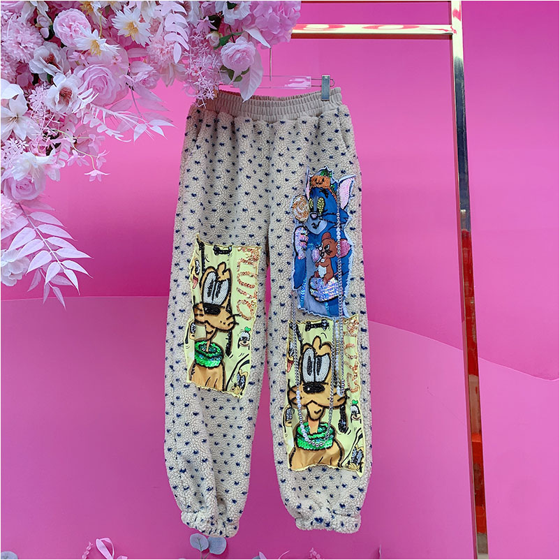 B718欧美设计师2025冬季新款贴布刺绣卡通流苏链条颗粒绒休闲裤女